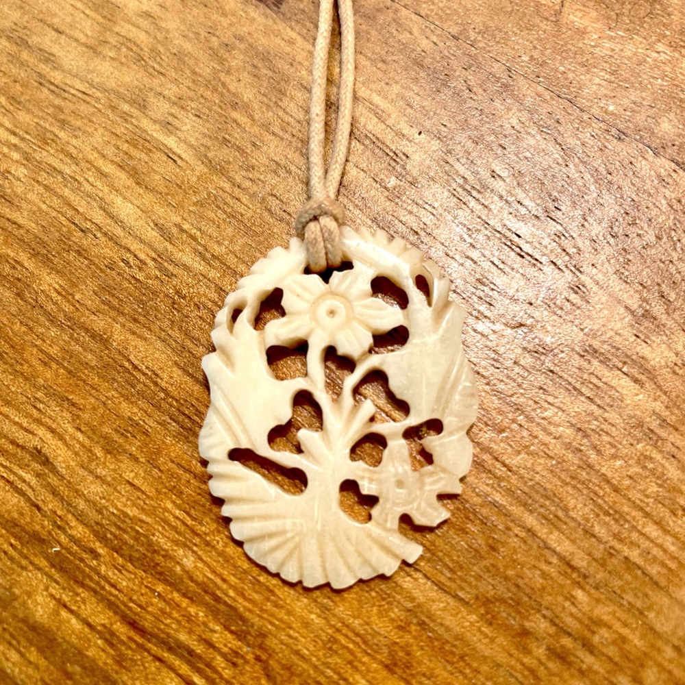 Carved Floral “Faux Bone” Necklace on Leather Rope